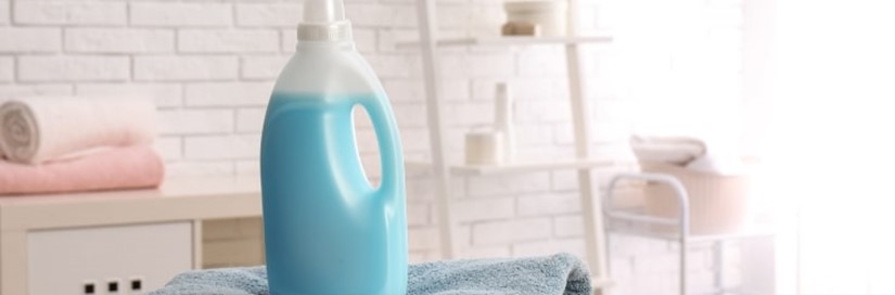 Laundry Detergent Bottle On Towels Min